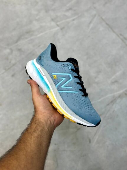 کتونی نیوبالانس مردانه مدل Fresh Foam 880v12 – رنگ آبی با جزییات زرد و سفید سایز 40